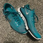 Nike  teal blue 6.5 running shoes Photo 2