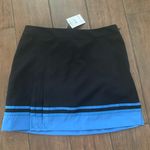 IZOD  Stretch XFG Golf Skort Black size 4 NWT Photo 0
