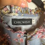 Chic Wish Flying Petals Print Puff Sleeve Ruffle Dress in Lavender Photo 4