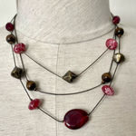 Multi strand floating bead necklace Photo 0