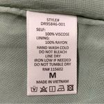 All in Favor Sage and Teal Animal Print Dress Photo 11