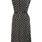 “Elegant vintage black dress with beige polka dot print. Classic and feminine Photo 0