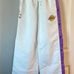NWT NIKE X AMBUSH Womens track pants LA Lakers warmup tear away $200.00 tags XS Gold Photo 0