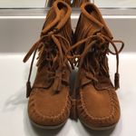 Minnetonka Women’s Leather Suede Moccasin Fringe Tassel Lace-Up Wedge Booties Photo 1