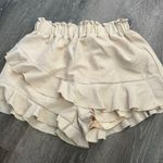 Tan ruffled shorts size medium Photo 0