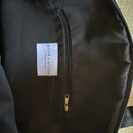 Alice + Olivia black and white striped duffle bag Photo 1