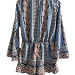 Red Camel Ladie’s  One-piece Romper Size Medium. Photo 2