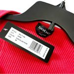 Bebe NWT  Coral Red Rosey Cut Out Mini Sweater Dress - Medium Photo 8