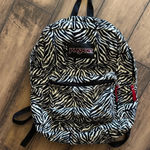 Jansport  Zebra Print Backpack with Black Accents Photo 0