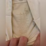 Free People  Ivory Long Sleeve Fitted Bodysuit.  Size-M/L Photo 4