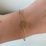 Etsy Delicate Gold-Tone Wire Bracelet with Coin Charm Photo 1