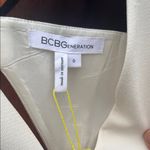 BCBGeneration  White Ribbed V-Neck Jumpsuit Photo 1