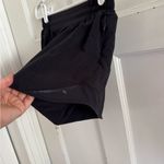 Lululemon  On The Fly black shorts size 4 Tall Photo 4