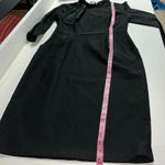 Black traditional dress Muxxn large black dress front pockets side zip front tie Photo 2