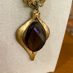 Jessica Simpson 7 strand gold tone statement necklace brown pendant and AB beads Photo 2