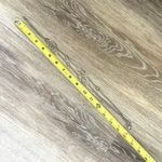 Long silver tone necklace with circles Photo 3