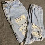 Forever 21 Ripped Jeans Light Wash, torn leg, elastic Ankle, tapered Size small Photo 3