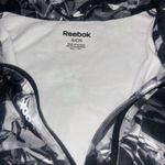 Reebok Women’s  1/4 zip workout jacket size small Photo 1