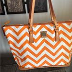 Dooney & Bourke Authentic leather/canvas Orange Chevron zip top Tote Bag Photo 8