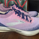 Brooks  Levitate 2 women's running shoes in a purple and pink colorway. Photo 0