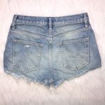 We The Free  Women’s Distressed Raw Hem Light Wash Button-Up Denim Shorts Photo 5