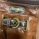 Kathy Van Zeeland  Y2K Crossbody Purse Fleur De Lis Buckles Photo 1