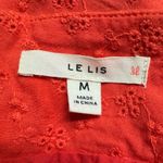 Le lis Women’s Coral Eyelet Ruffled Zippered Short Skirt Size: Medium Photo 6