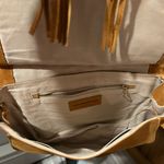 See By Chloe Chloe EUC Tan Crossbody Saddle Bag with Decorative Closure and Tassel Photo 1