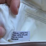 White/cream clutch cute for going out, put your hand through the ring for ease White Photo 4