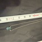 Elegant Stearling Silver and Blue Topaz with Mother of pearl Pendant Necklace Photo 6