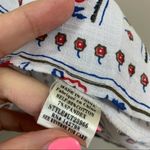 Love Riche  Lace-up Floral Bell Sleeve White Top Photo 3