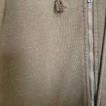 Brandy Melville  brown zip up sweater with graphic letters on the back Photo 2