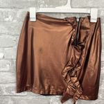 Line and Dot Gold Mini Pencil Skirt with Ruffled Detail Photo 2