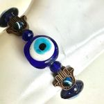 Glass evil eye hamsa stretchy bracelet Blue Photo 4