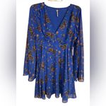Free People  mini dress in a blue floral pattern with long bell sleeves L Photo 2