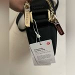 Lululemon NWT Crossbody Camera Bag Black Gold, Adjustable Strap Photo 10