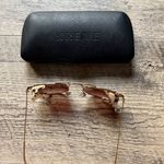 Krewe Sunglasses with Gold Frame and Pink Lenses Photo 6