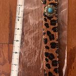 Free People  Leopard Print Keychain with Turquoise Accent Photo 0