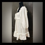 Mable  white Eyelet over the shoulder sleeve dress - Size Medium. *** Refer to measurements. Perfect Easter or spring dress... even graduation coming up.  Says Medium but sleeves extends for a heavy bustted top frame. Gently warn and excellent condition. Measurements approximately 15” from armpit to armpit x 32” long. None smoking home. Priced to sell at as is condition. Don’t like my price make reasonable offer. Photo 1