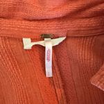 Free People Orange,  mini dress with a tie around the waist Photo 1