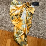 Pretty Little Thing β
NWT Ruched Side Midi skirt - Orange Tie Dye β
Photo 11