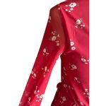 Hollister -RED FLORAL DRESS-SIZE XS Gorgeous red floral faux wrap dress, long sleeves,v neck had hook closure, dress is fully lined, semi sheer sleeves, elastic waist, excellent condition Measurements: Bust: armpit to armpit 16 inches Waist: side to side 12-15 inches Length: shoulder seam to bottom 36 1/2 inches Photo 6