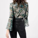 Bodysuit, emerald green and black, flowy sleeves and trim. NWT Size L Photo 1