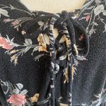Torrid -SUPER SOFT BABYDOLL TOP WITH PINK & GOLD FLOWERS-WOMENS SIZE 1X Black babydoll top with pink and gold flowers, long sleeves, lace up bodice, lots of stretch, 95% rayon and 5% spandex, excellent condition Measurements: Bust: armpit to armpit 24 inches Length: shoulder seam to bottom Front: 29 inches Back: 33 inches Photo 5