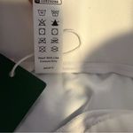 Halara  High Waisted Decorative Button Split 2-in-1 Pocket Quick Dry Golf Skirt S Photo 8