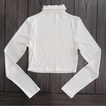 Princess Polly | 90s Y2K Nicola Long Sleeve Ruffled Mock Neckline White Crop Top Photo 1