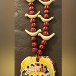 Native American 1970s Ted DeGrazia Hand painted Children of the World Necklace Brown Photo 2