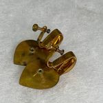 Vintage 1940’s gold tone heart drop earrings faux emerald centers. Photo 2