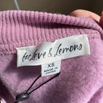 For Love & Lemons NWT Josie Cropped
Crewneck Pullover Sweatshirt in Lilac Photo 4