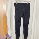Fabletics  Black High-Waisted 7/8 Pocket Leggings with Mesh Sides Size Medium Photo 3